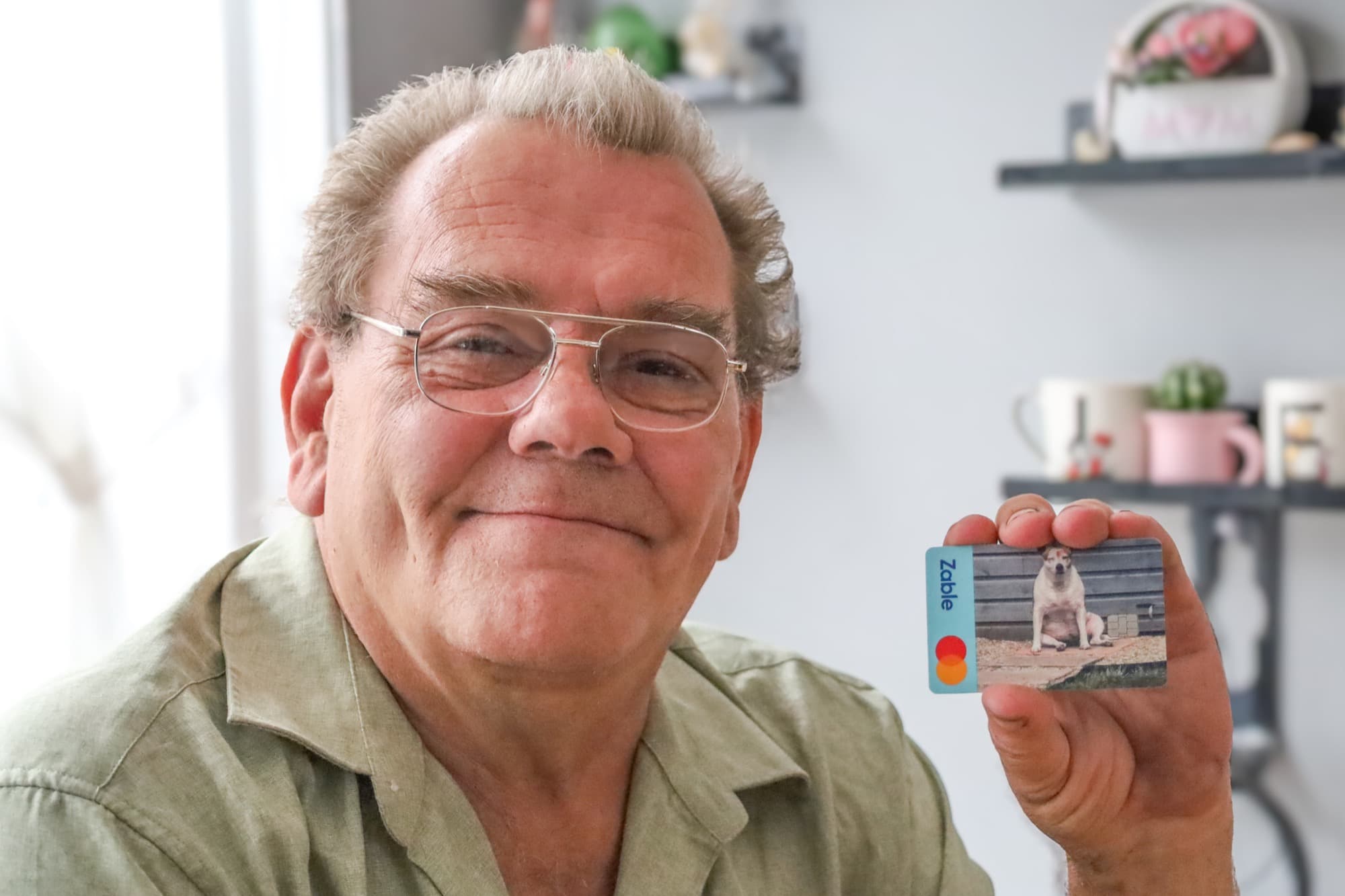 Zable customer smiling at home